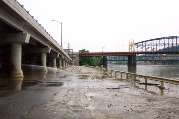 This photo, taken before the Mon Wharf Landing was constructed, shows where eastbound trail users will begin to climb the ramp to access the Smithfield Street Bridge.