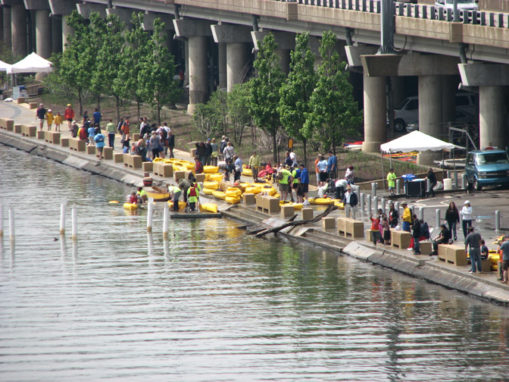 Photo of Mon Wharf Landing filled with kayakers
